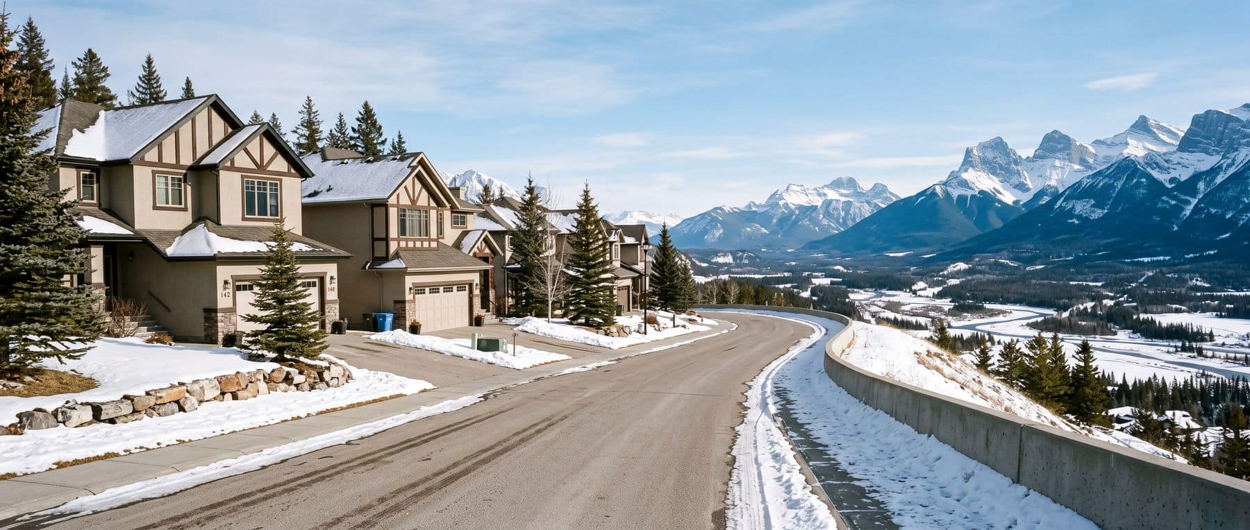 Eagle Terrace Canmore homes on the elevated residential terrace, with winter sun and an open view across the Bow Valley