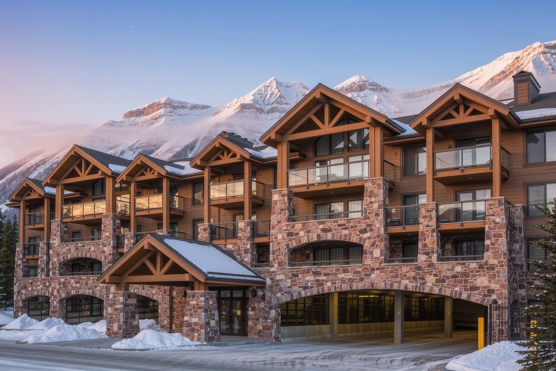 Stoneridge, Canmore: stone lodge building with underground parking